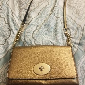 Gold Coach crossbody purse